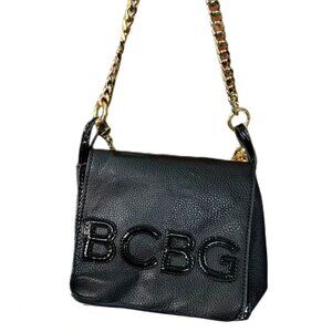 BCBG Black Handbag with Gold Details – Elegant & Versatile